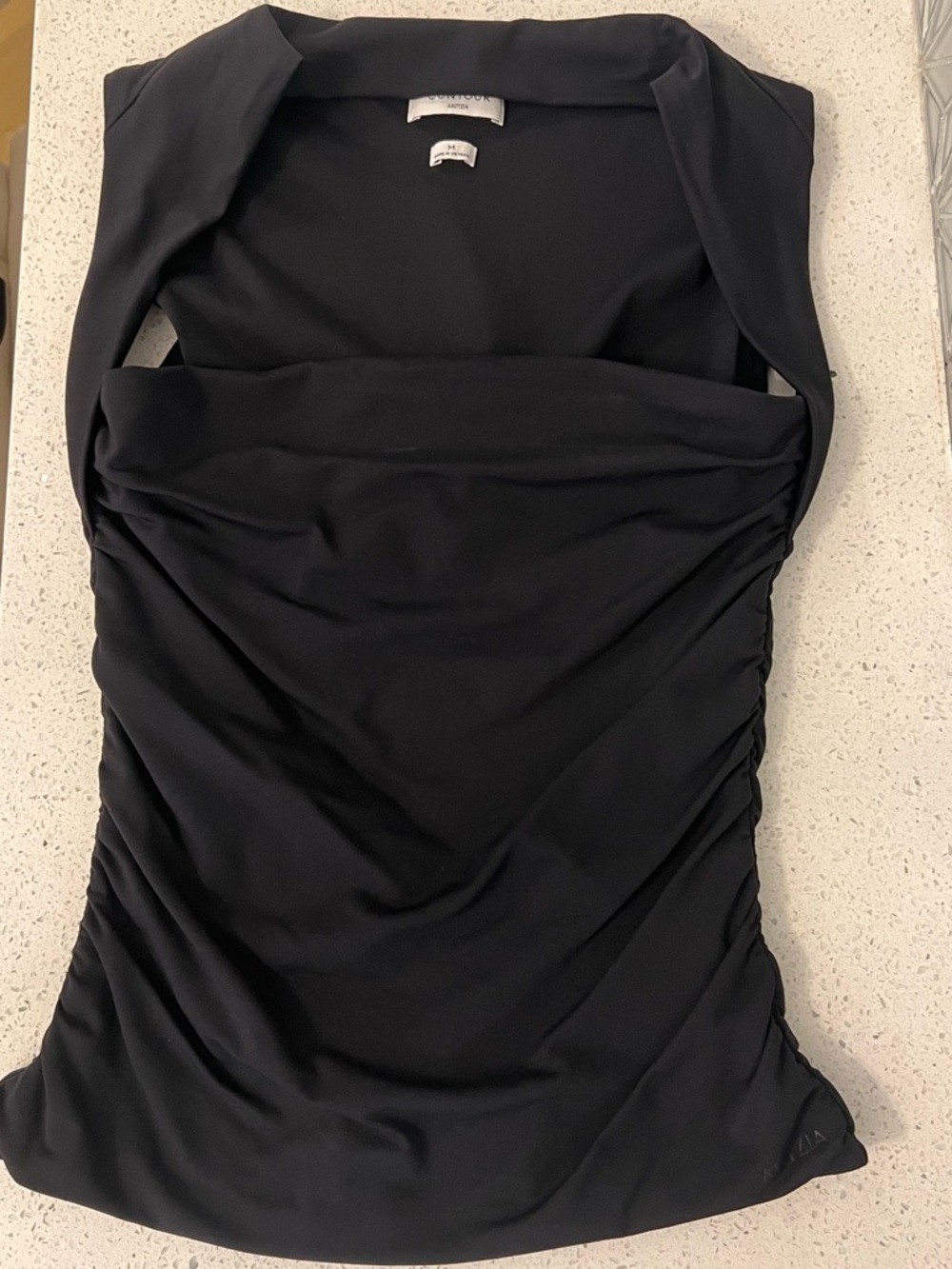 Aritzia “Original Contour Flourish Top”